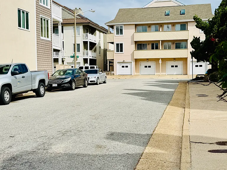Beach access is between the two buildings at the end of the street.