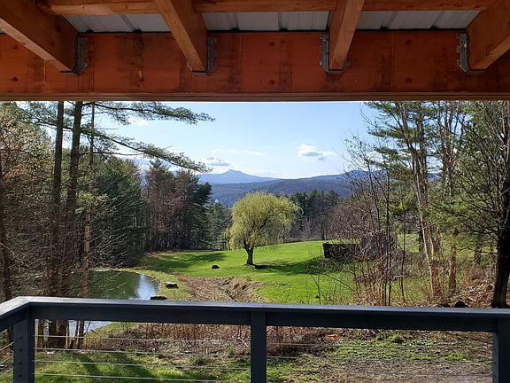 Breathtaking view on Camel's Hump, State House dome, neighbor's pond and meadows, from semi-covered deck