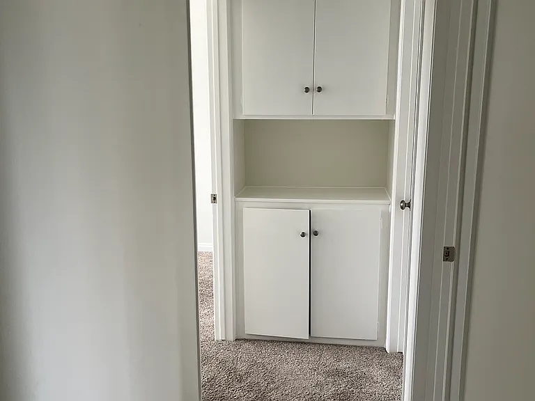 Upstairs hallway with linen closet