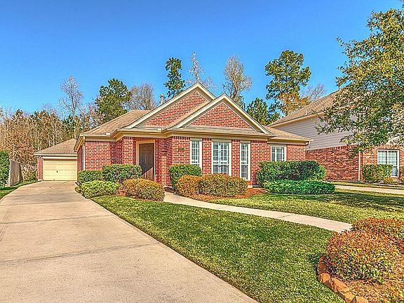 Separate garage and extra long driveway.