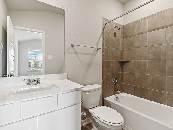 Guest bathroom in the Hughes floorplan at a Meritage Homes community.
