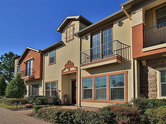 The townhome with the greenbelt view to the side.