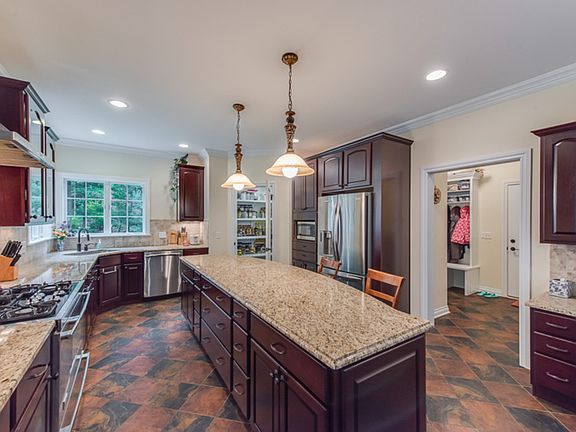 Other view of kitchen shows the magnificent space in this area.....lots of room to entertain family and friends.