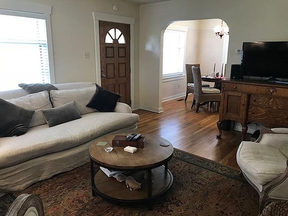 View of front door and dining room from the living room