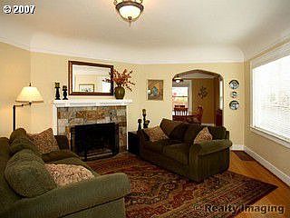 Living Room: High Ceilings, Gas Log Fireplace