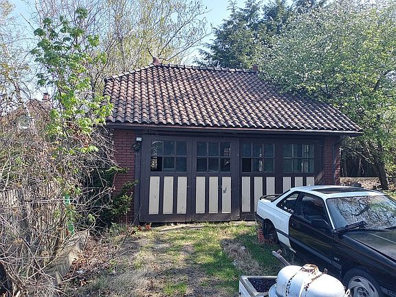 Detached 2 car garage with a