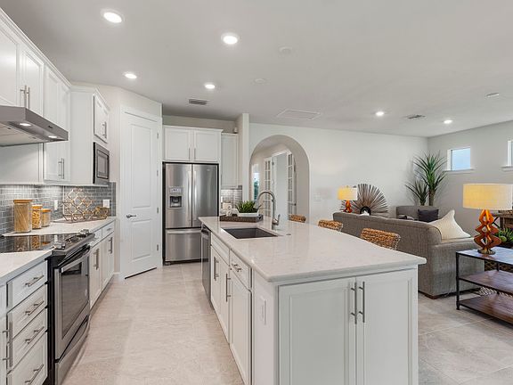 Model Representation Large center island with beautiful granite countertops