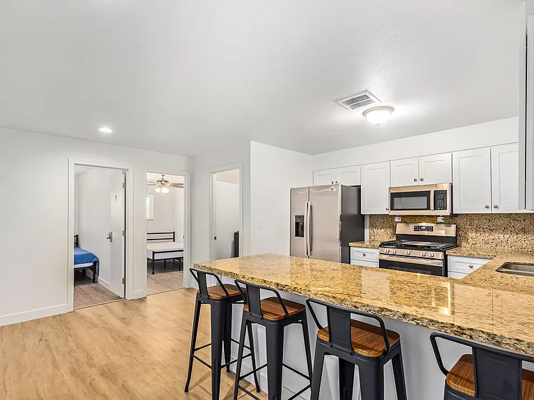 Totally updated kitchen with Gas stove, refrigerator, dishwasher and mic