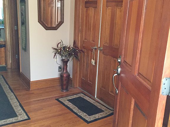 Foyer view den/bedroom doors