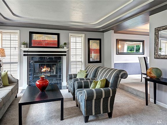 Great room with fireplace and trey ceiling
