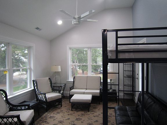 Living Room (with cathedral ceiling and ceiling fan)