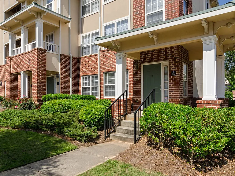Clean walkways and beautiful brick steps invite residents home