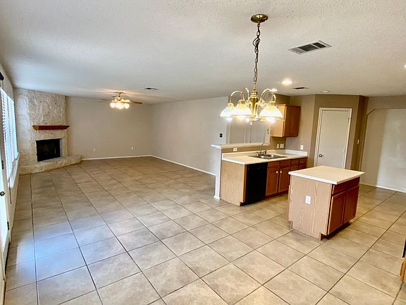 Open floor plan with living room and fire place