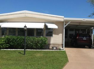 923 Thrush Cir, Barefoot Bay, FL 32976