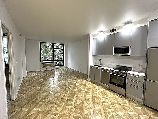 1st image of 316 E 3rd St APT 5E