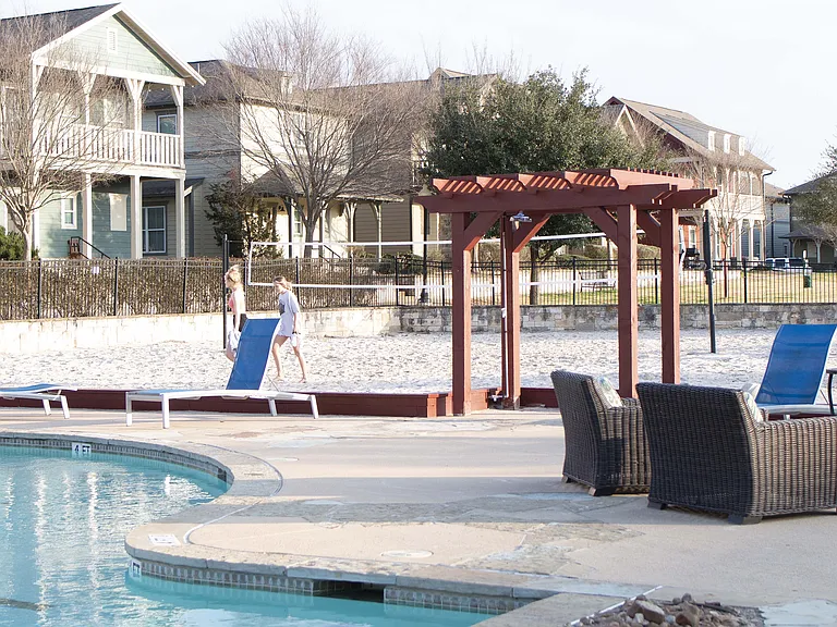 Experience relaxation at its finest with this serene community pool area.