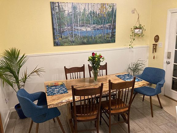 Dining room-double glass doors lead to deck.