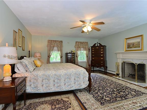 Marble fireplace in the master bedroom is beautiful.