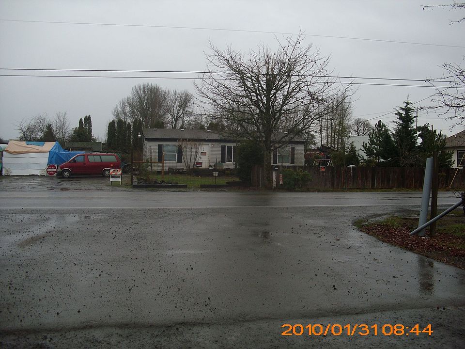 Street side view of house & property