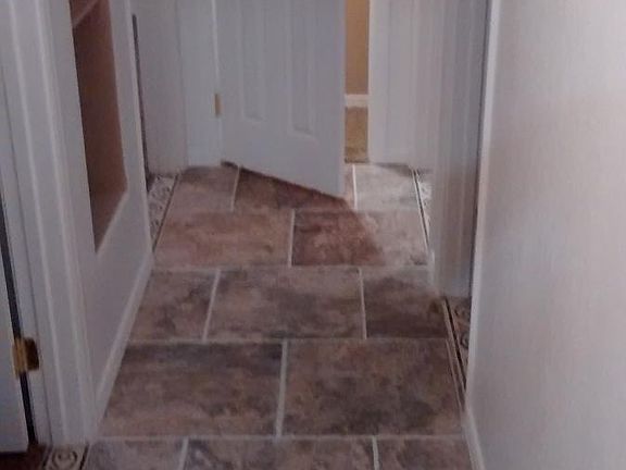 Decorative inlays to room transitions.