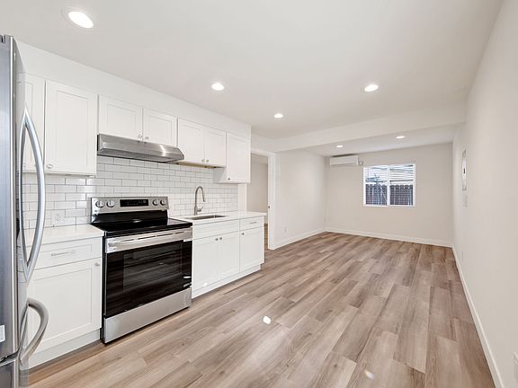 Kitchen and family room. New remodel, brand-new LG appliances
