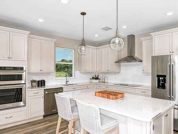 Open Kitchen with Stainless Steel Appliances