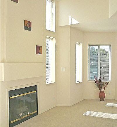  Floor to ceiling fireplace and sliding doors to balcony