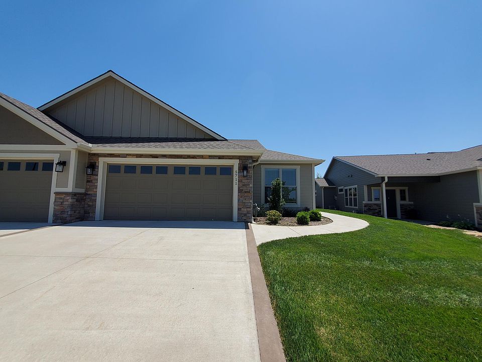 Townhome with large 2 car garage. Lawn care provided.