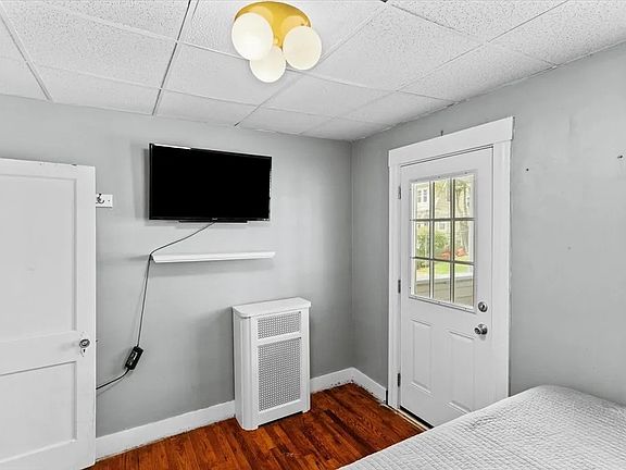 Main bedroom with access to front porch.