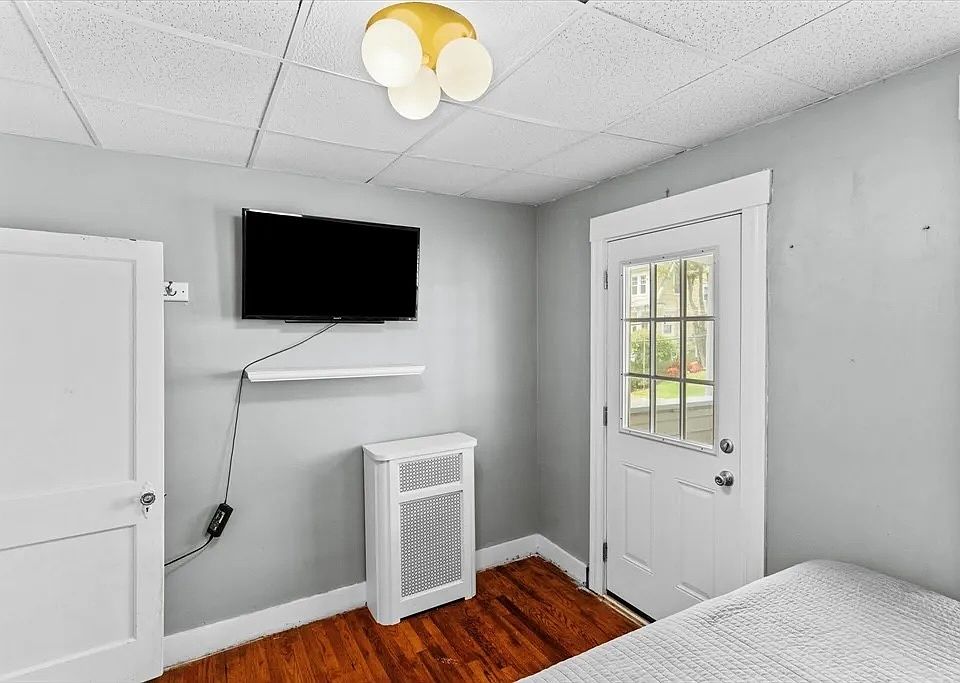 Main bedroom with access to front porch.