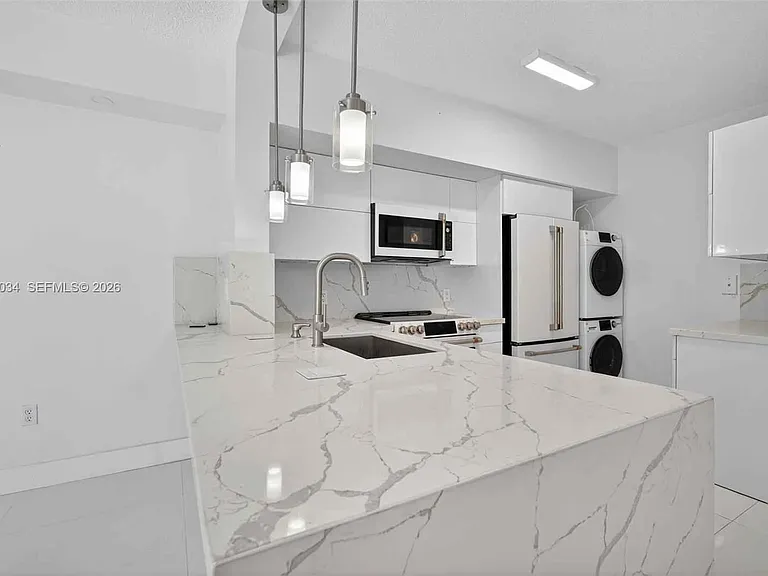 5077 NW 7th St — Photo 7
