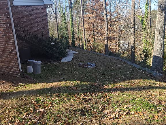 Private wooded back yard.