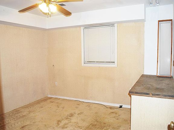 Former kitchen w/ wallpaper