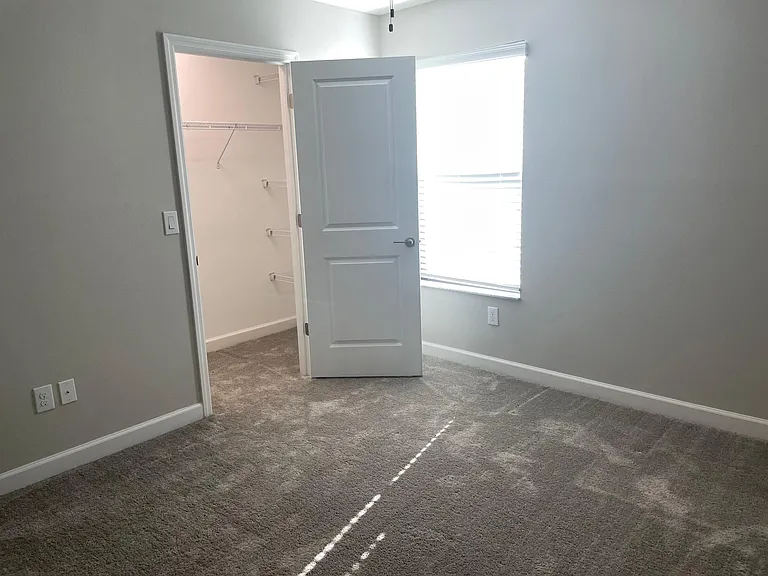 2nd bed room with walk in closet