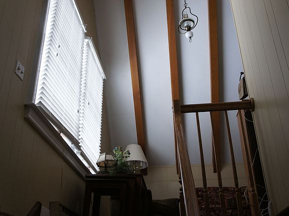 Stairway to sitting room, additional bedroom