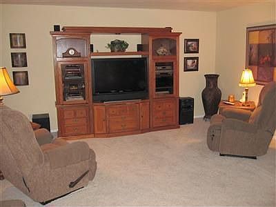 Huge living room with plush carpet, very comfy.