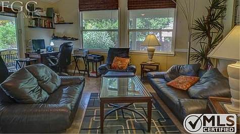 living room with lots of light and all tile