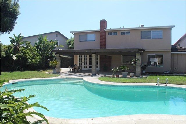Sparkling pool in spacious back yard