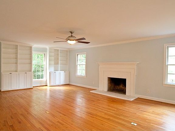 Family Room with Masonry fireplace and hardwoods