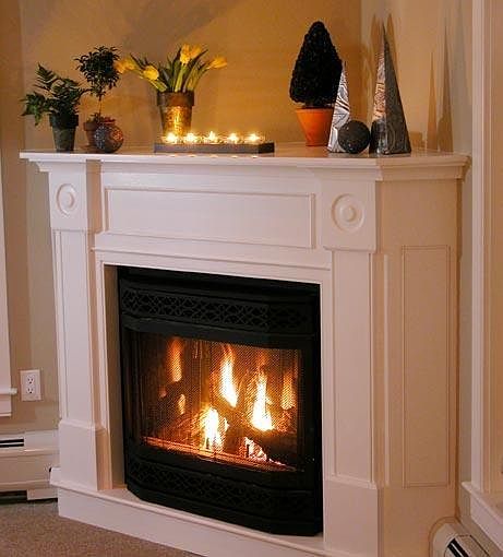 Cozy gas fireplace in living area.