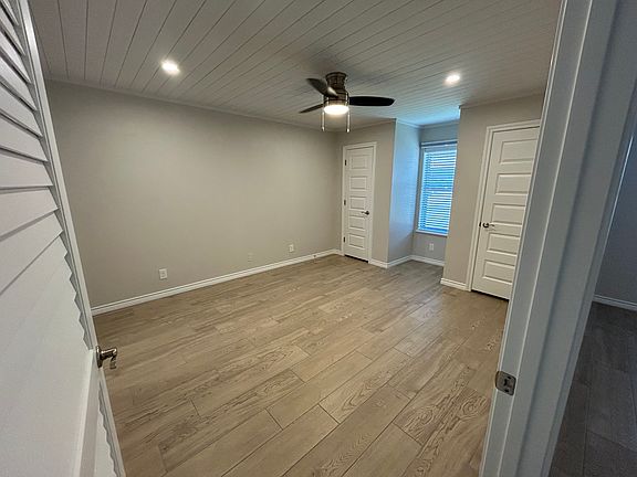 Bedroom will accommodate a Queen size be. Blackout shade over blinds for darker sleep setting.