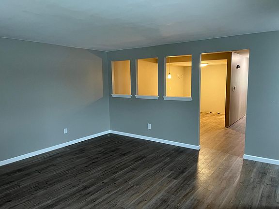 Living room looking towards kitchen and hallway