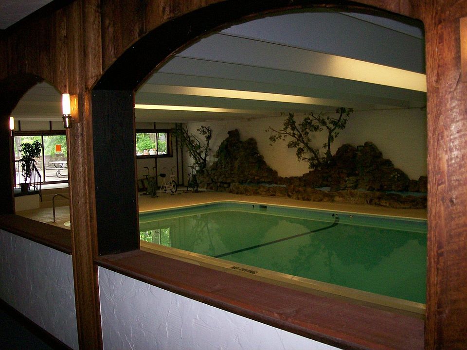 Heated indoor pool atttahed to party room and sauna.