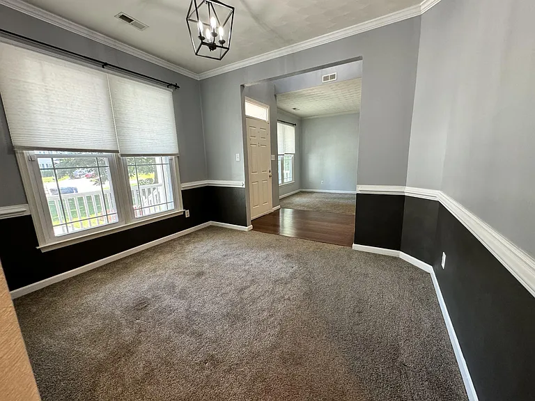 Formal dining room looking into front entry and living room