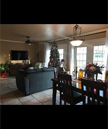 living/dining area looking to back of home