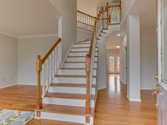 Welcome to 102 Creedmoor!  Grand and elegantly designed staircase with hardwood flooring throughout.