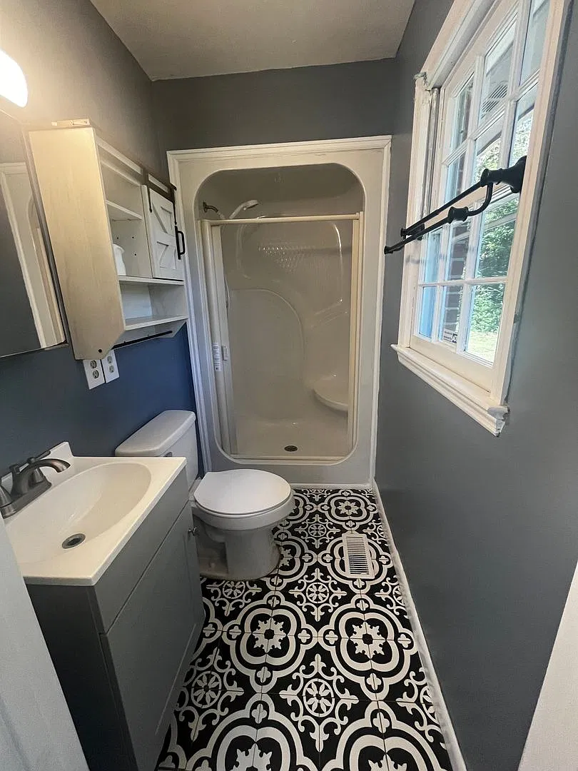 Charming 3-Bedroom Brick Ranch with Patio & Covered Parking! — Photo 3