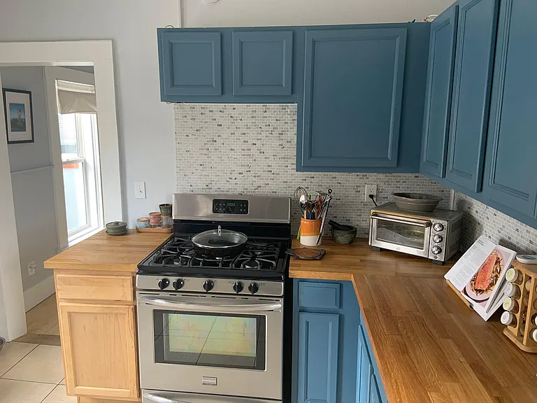 Kitchen with gas stove.