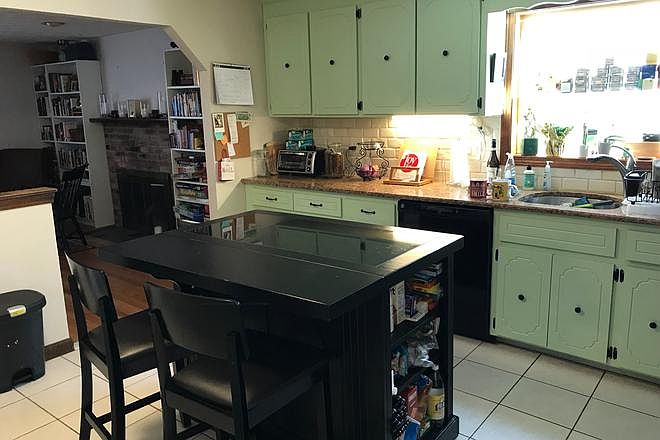 Open concept kitchen into living room and dining room.