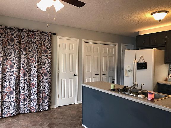 Kitchen open concept includes laundry room. Washer and dryer machines included in rent price.